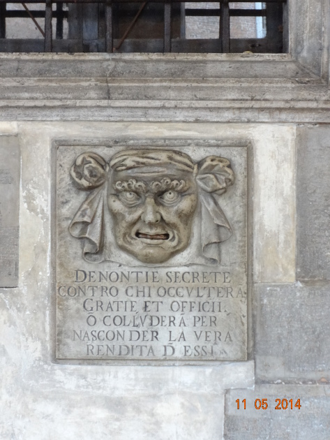 The Mouth of Secret Accusations at Doges Palace in Venice. People could anonymously submit accusations against anyone. It translates roughly as: "Secret denunciations against those who hide favors and offices or collude to hide the true income of them."